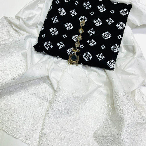 Elegant Dark Green Printed Lawn Suit with White Embroidered Dupatta